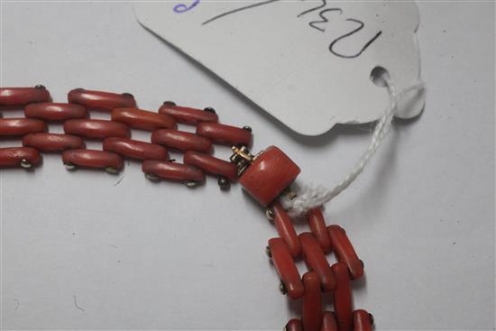 A gold and coral gate link choker necklace, 37cm.